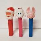 Three Vintage Pez Dispensers Santa Claus Pink Sheep Blue Bunny No Feet