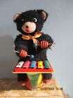 Vintage tinplate toy wind-up bear playing a xylophone. Working order.  c.1960s.