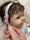 Silicone doll,  about 19-20 inches. Good Doll .