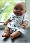 Vintage BERENGUER Realistic Vinyl Baby Girl Doll played with and some damage.