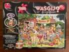 WASGIJ 10th Anniversary Limited Edition 1000 Piece Puzzle - The Secret is Out!